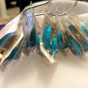 It is the 80s  and 90s style sparkling blue hoop earring.